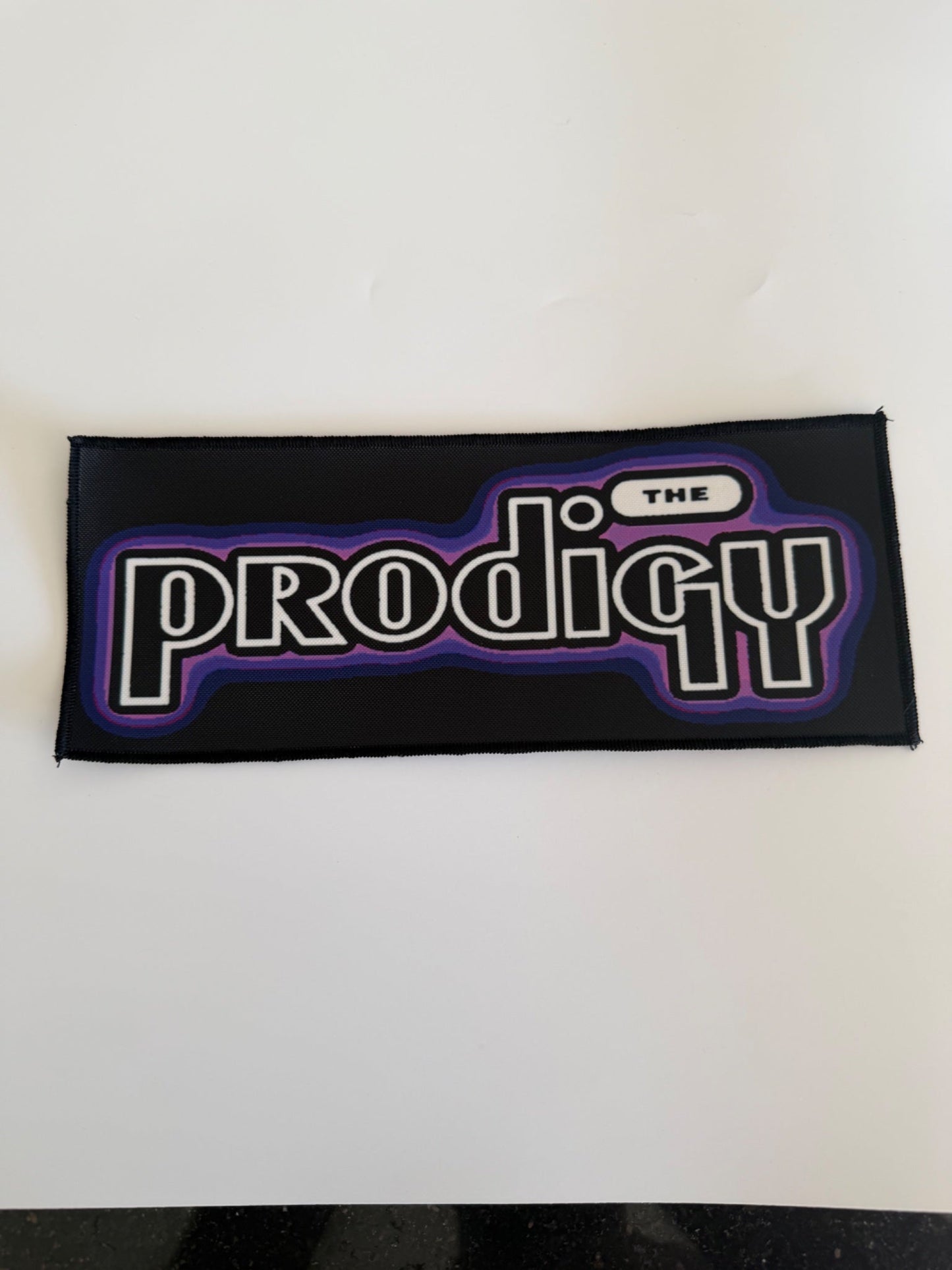 Merchandise - The Prodigy - Logo Woven Patch (Black, Purple)
